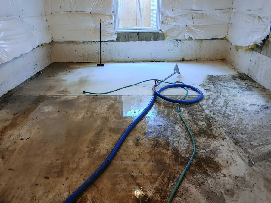 Restoration crew extracting and drying a flooded basement in La Grange, IL